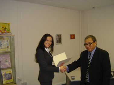 Ambassador Dr. Kuban Ilyasovich Mambetaliev and Honorary Consul Domenica Schiel